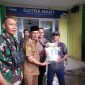 Kades Kohod serta Babinsa saluran bantuan pangan CBP 2024.(ist)
